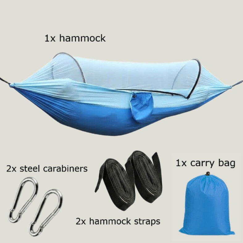 Blue DANGL BushShield hammock resting on beige fabric, showcasing durable outdoor hammock with comfortable fabric and sturdy design.