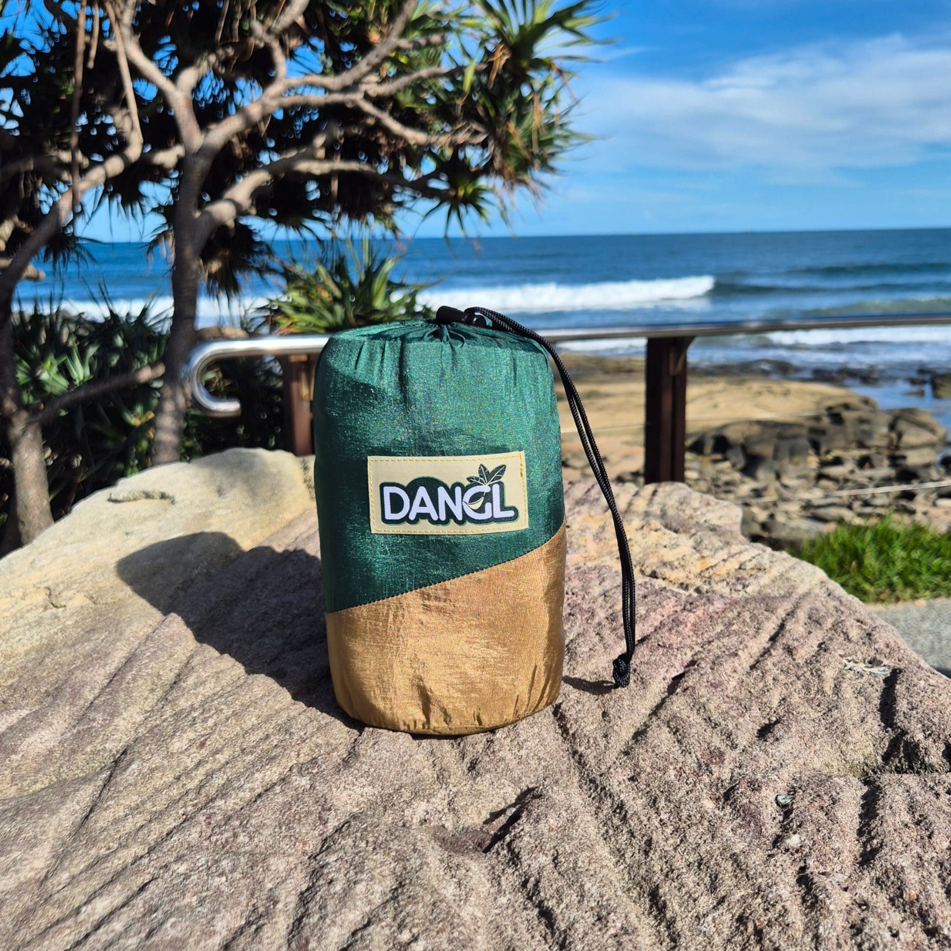 DANGL Roamer in vibrant green color with a durable strap, designed for outdoor adventures and active wear.