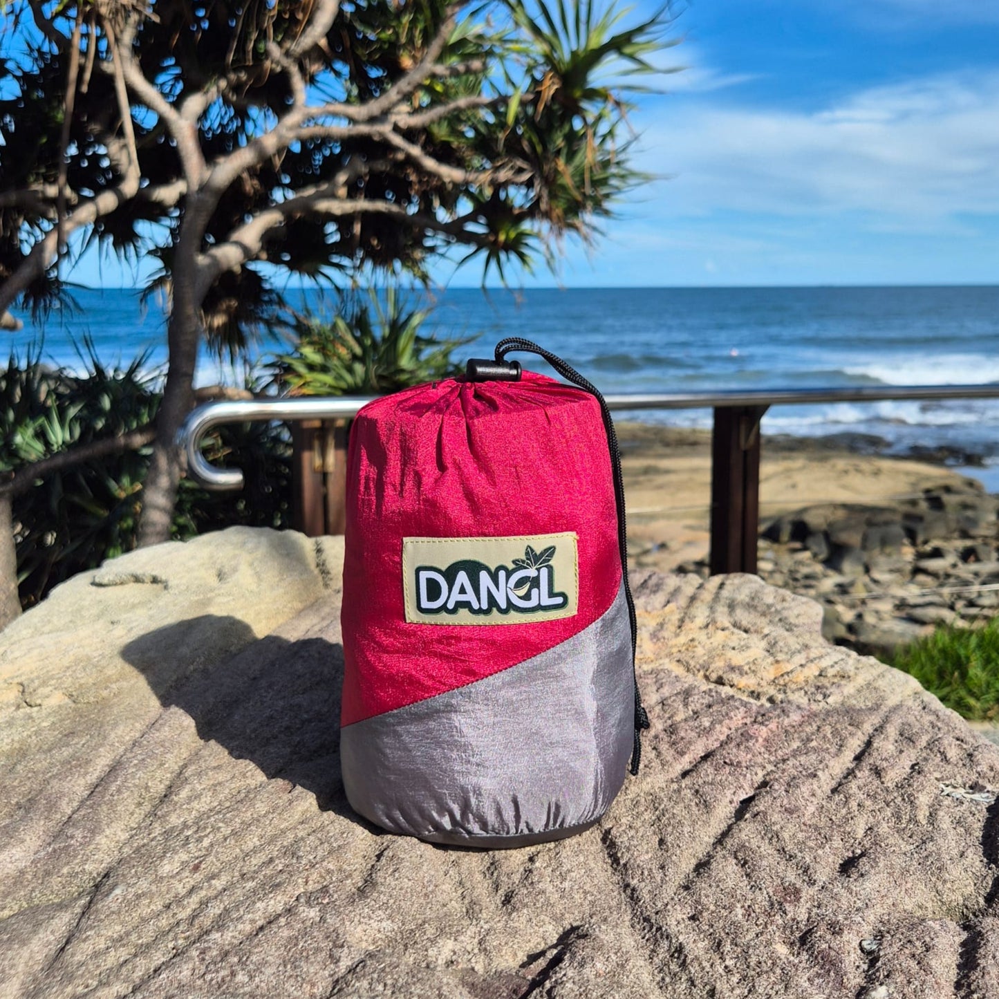 DANGL Roamer in vibrant red color, showcasing its sleek design and durable material, perfect for outdoor adventures.