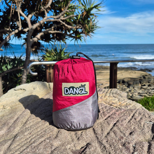 DANGL Roamer in vibrant red color, showcasing its sleek design and durable material, perfect for outdoor adventures.